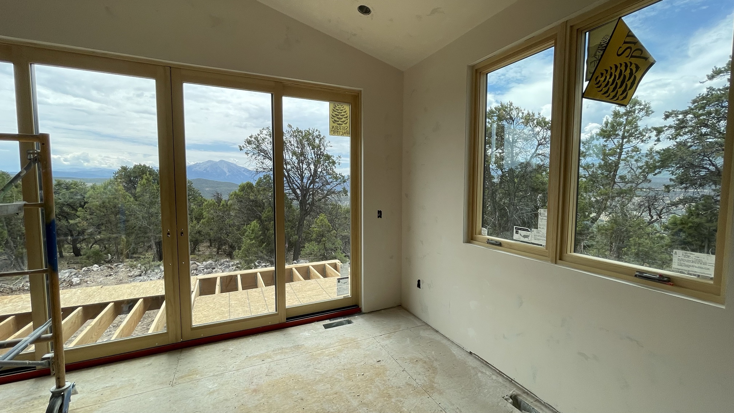 Dining room sliding door opening to the deck with Mt. Sopris views — July 26, 2026