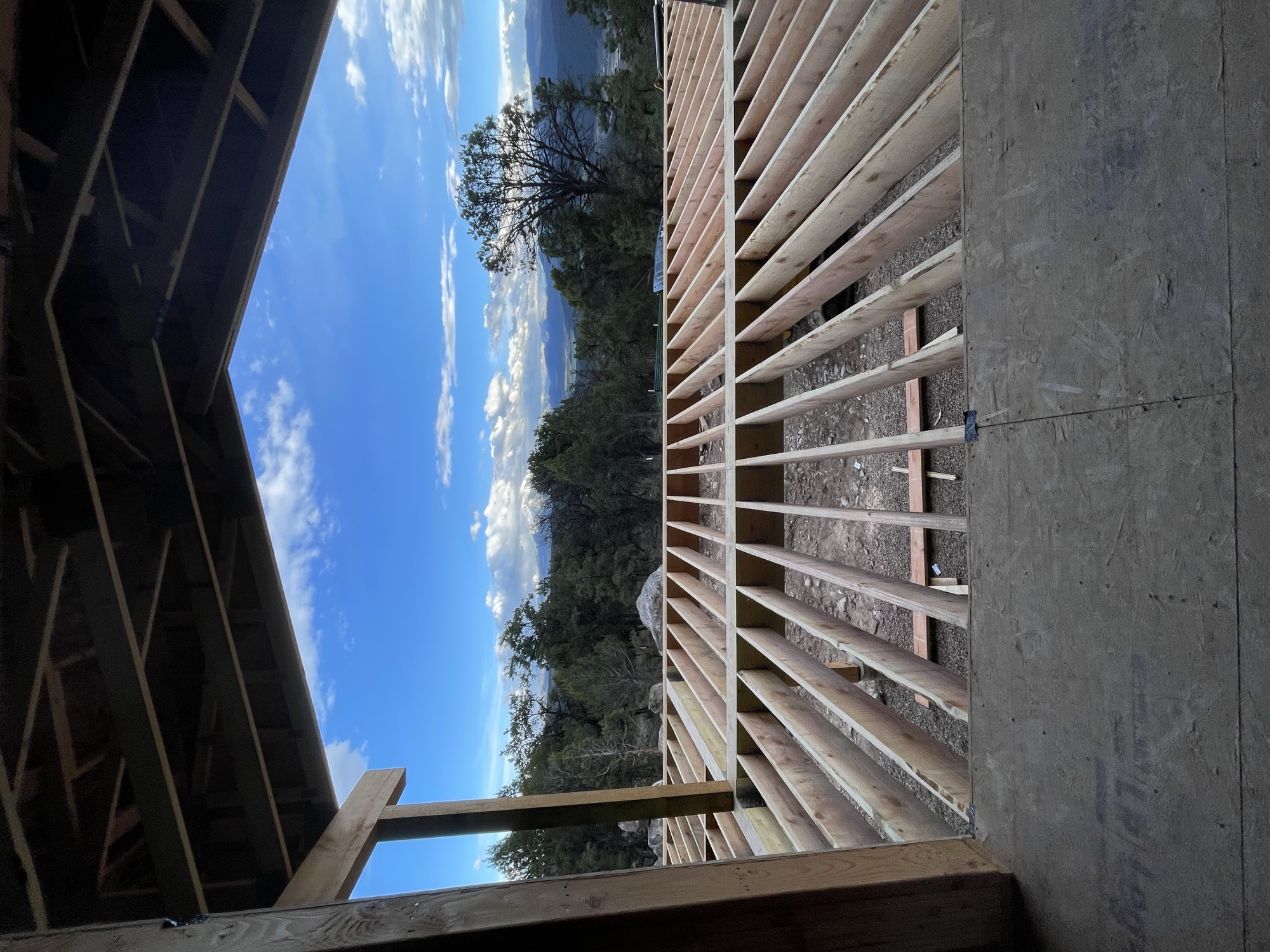 Exterior progress with deck framing — April 2, 2026