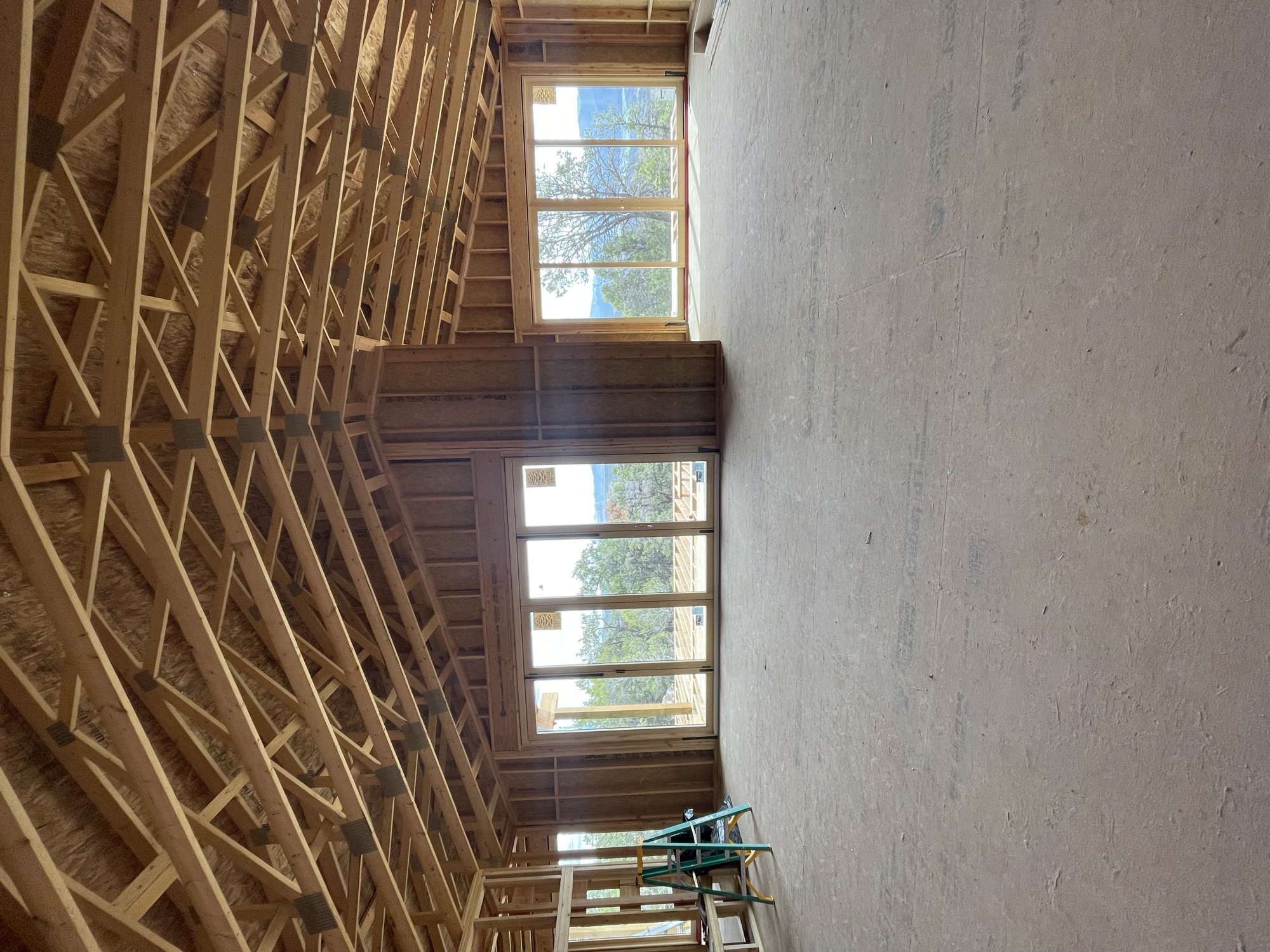 Great room framing with panoramic windows open to Mt. Sopris — April 10, 2026