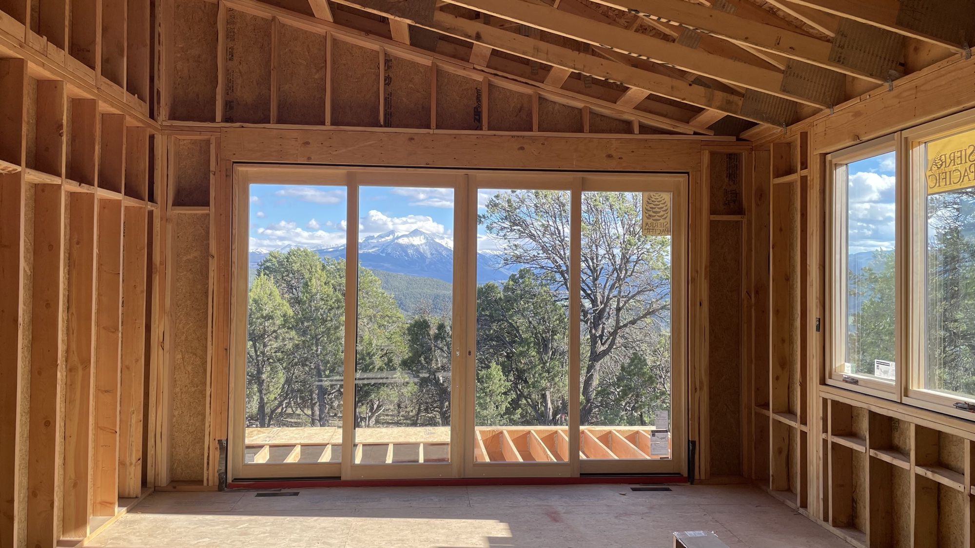 Main-level sliding door wall framing a clear view of Mt. Sopris — April 15, 2026